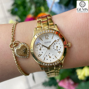 Ladies Guess Stainless Steel Gold Tone Strap, Mini Dial SKU 4001204