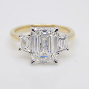 18CT YG and Platinum Head 3 Lab Grown Diamonds, Centre Emerald Cut and side Step Cut Trapezoids 3.53ct Engagement Ring SKU 7707115
