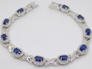 Sterling Silver Kiss Hug Link, Blue & Clear CZ Bracelet SKU 0134002