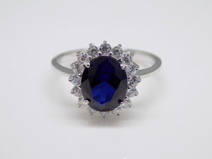 Sterling Silver Oval Blue CZ & CZ Halo Ring SKU 0142002