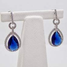 Load image into Gallery viewer, Sterling Silver Blue CZ Pear Shape CZ Halo Earrings SKU 0142008
