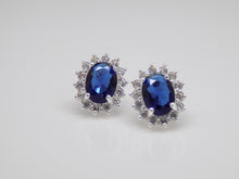 Load image into Gallery viewer, Sterling Silver Oval Blue CZ Halo CZ Earrings SKU 0142009
