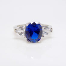 Load image into Gallery viewer, Sterling Silver Blue &amp; Clear CZ 3 Stone Ring SKU 0142017
