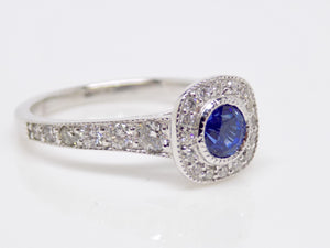 18ct White Gold Sapphire and Diamond Halo/Diamond Shoulders Engagement Ring 0.60ct SKU 8802081