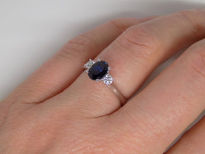 9ct White Gold Oval Sapphire And Round Brilliant Side Diamonds 3 Stone Engagement Ring SKU 5706054