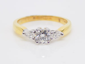 18ct Yellow Gold Round Brilliant Centre Diamond Pear Side Diamonds 3 Stone Engagement Ring 0.65ct SKU 8803123