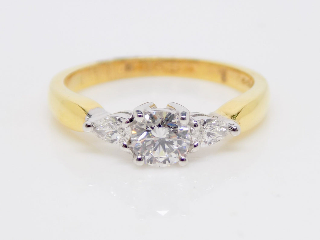 18ct Yellow Gold Round Brilliant Centre Diamond Pear Side Diamonds 3 Stone Engagement Ring 0.65ct SKU 8803123