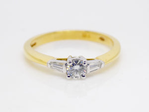 18ct Yellow Gold Round Brilliant Centre Diamond & Baguette Diamond Sides 3 Stone Ring SKU 8803078