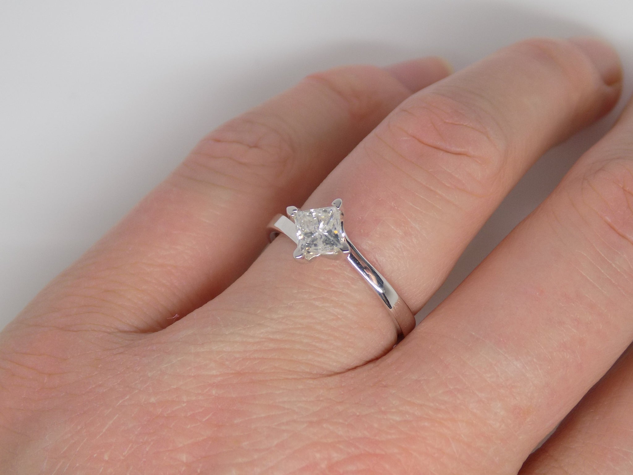 Solitaire twist sales engagement ring